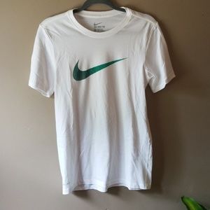 white nike shirt with green swoosh